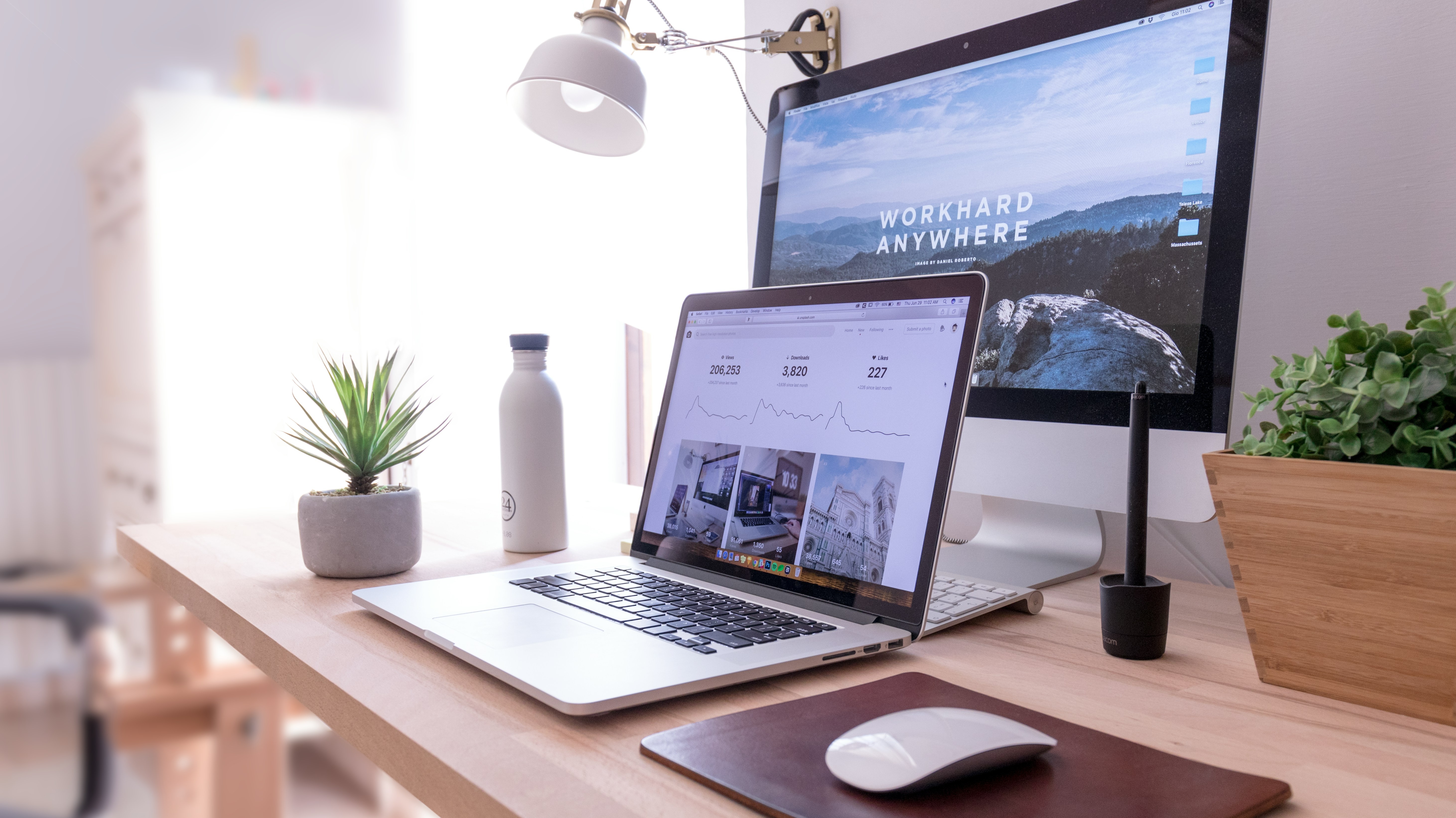 laptop and screen on desk